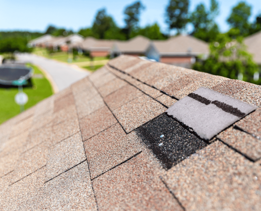 Loose shingle on roof