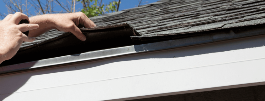 An illustration of fixing curled and cracked shingles on a roof.