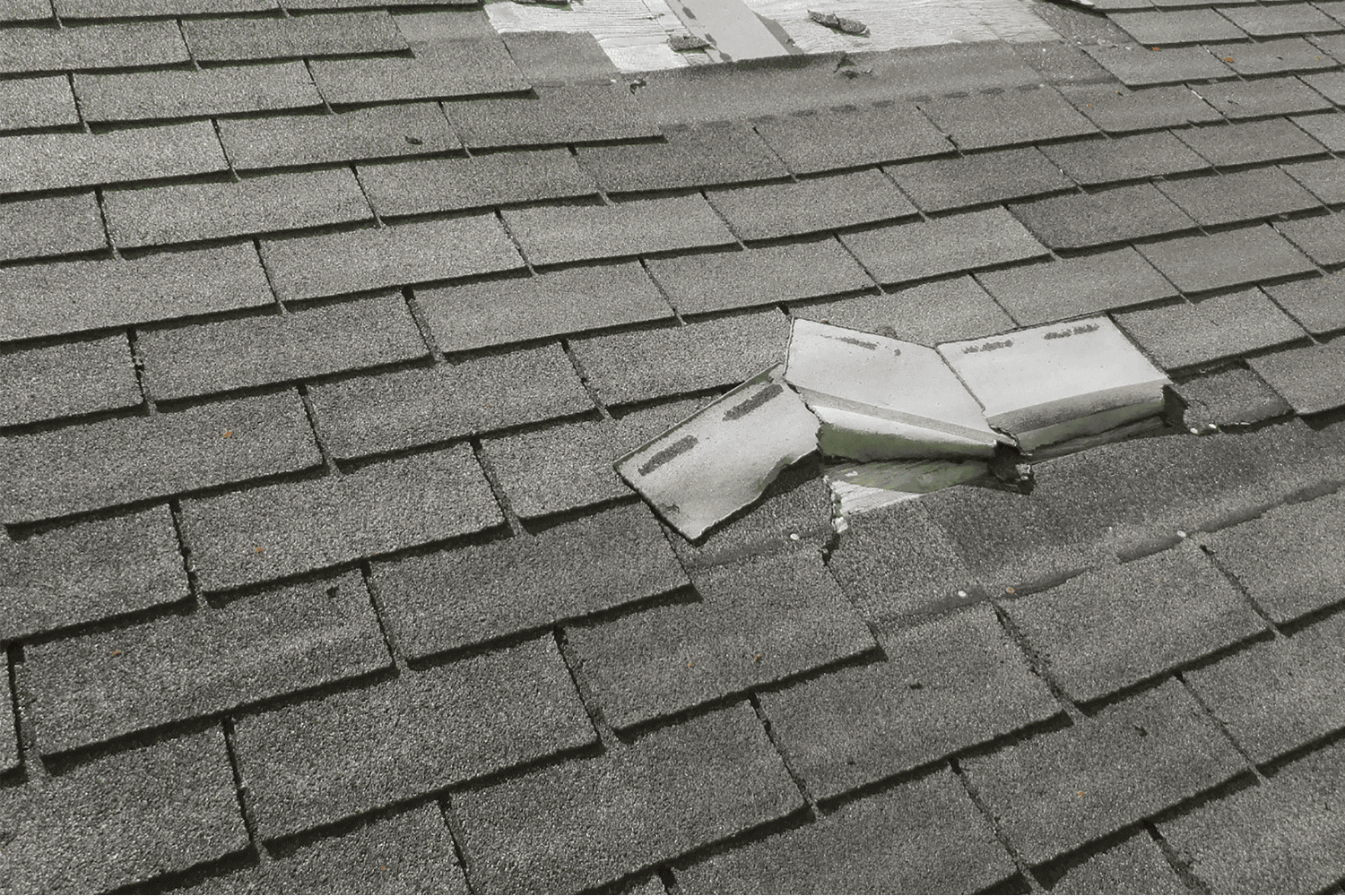 A photo illustrating the benefits of installing impact resistant shingles