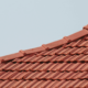 An overview of minimum roof slope for shingles, featuring various types of roofs