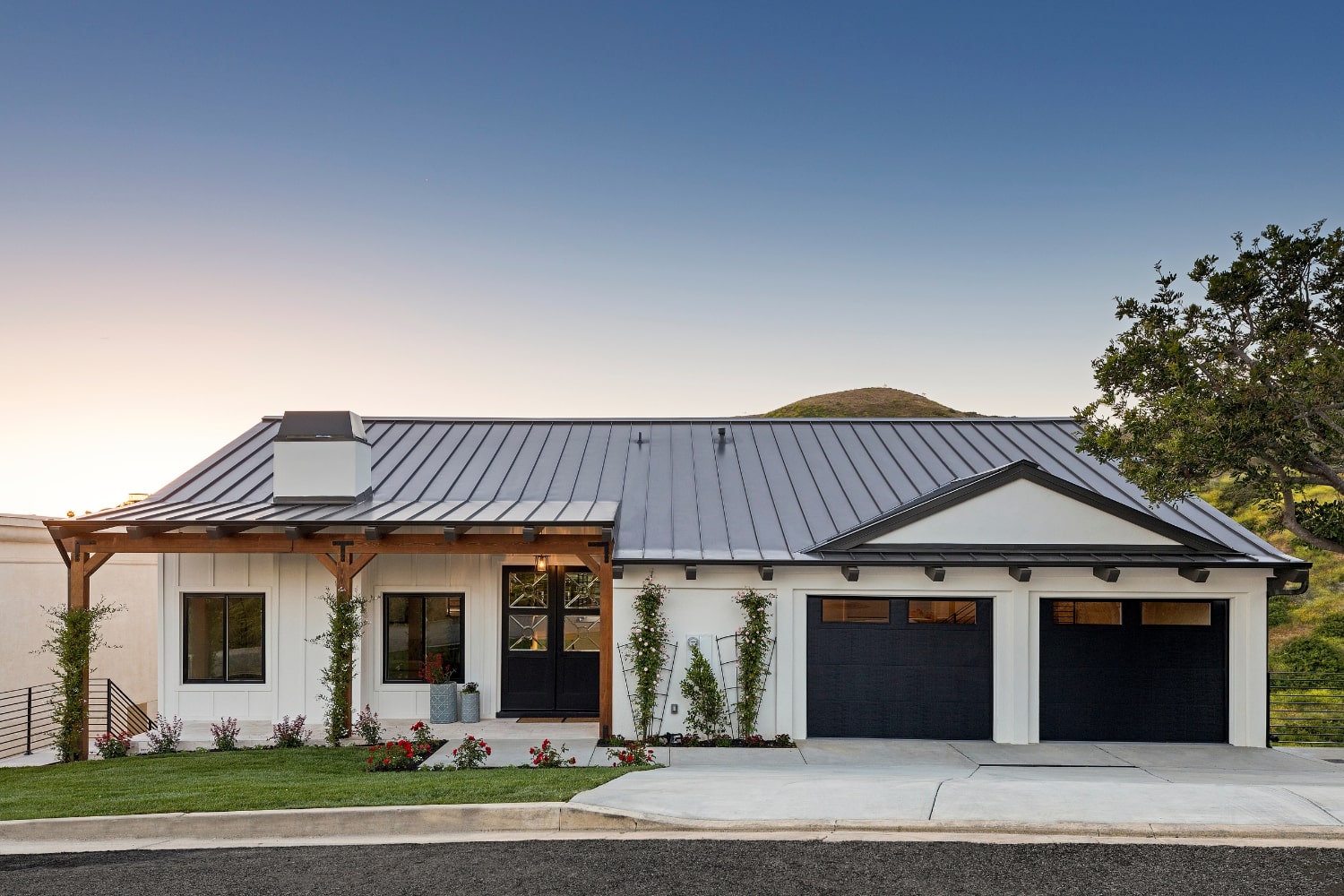 white home with metal roof